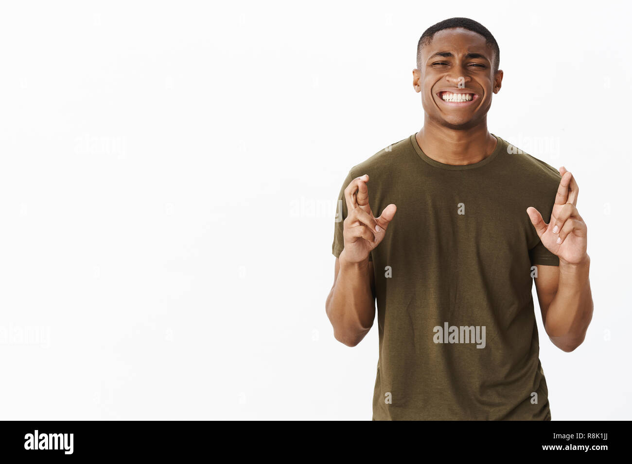 Portrait of faithful intense young african american male student ...