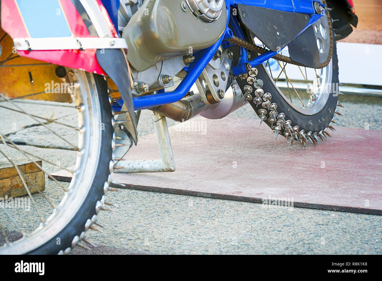 Motorcycle spiked wheels for speedway Stock Photo Alamy