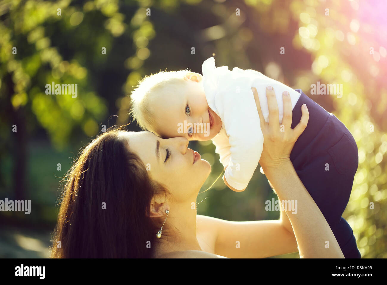 Happy cute baby boy and mother having fun Stock Photo Alamy