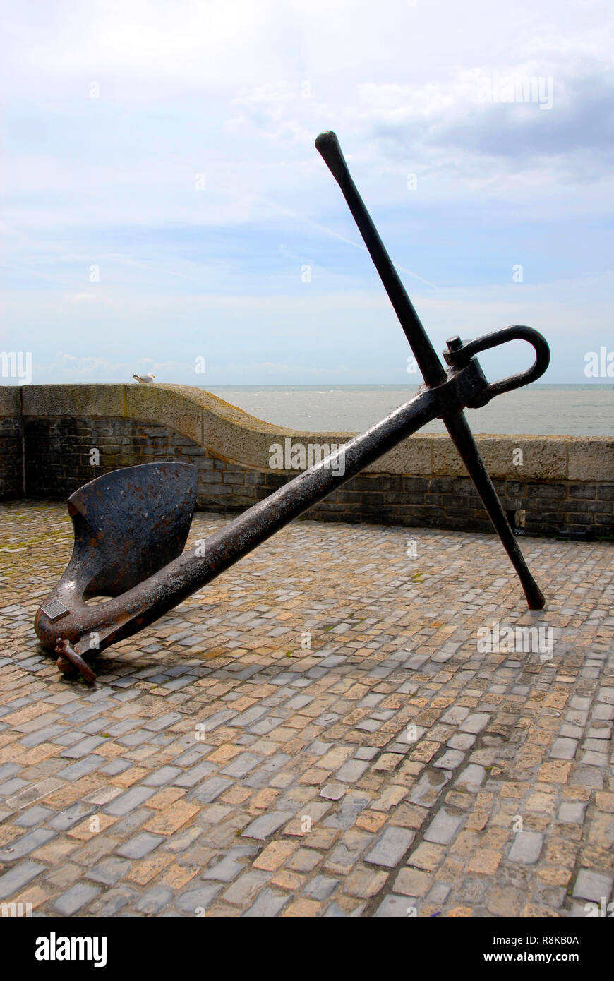 Old anchor on the seafront, Lyme Regis, Dorset, England Stock Photo