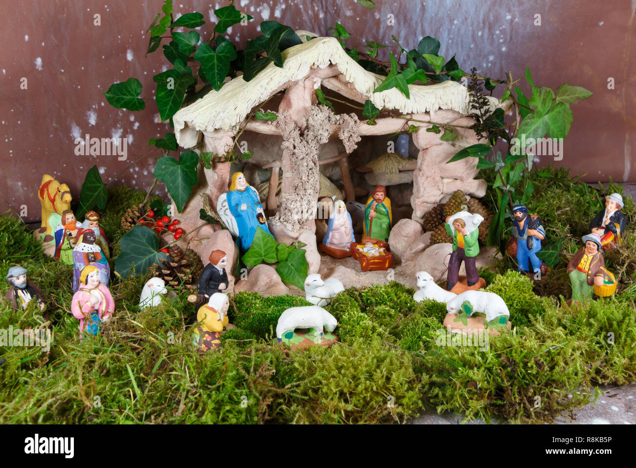 Nativity scene with provencal Christmas crib figures in terracotta Stock Photo