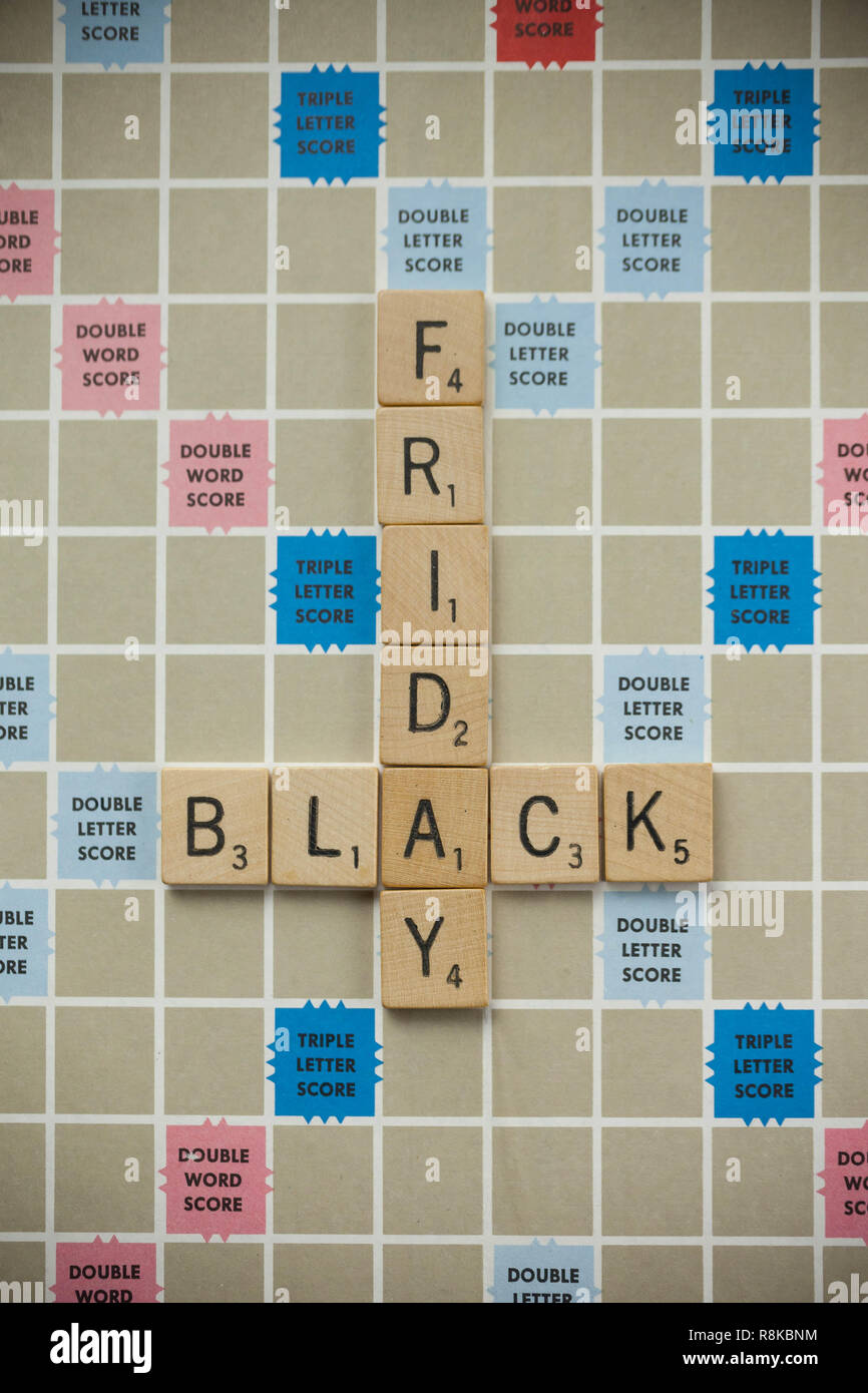 WOODBRIDGE, NEW JERSEY - November 9, 2018: Scrabble tiles spell out 'Black Friday' on a vintage game board Stock Photo