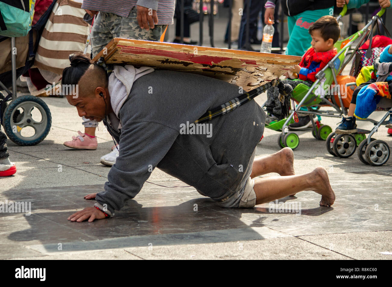 A pilgrim crawling to the Basilica of Our Lady of Guadalupe in Mexico City, Mexico Stock Photo