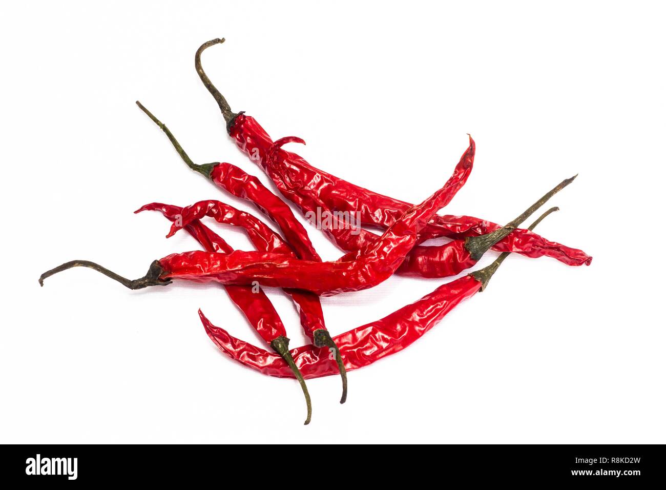 many cayenne pepper isolated Stock Photo Alamy