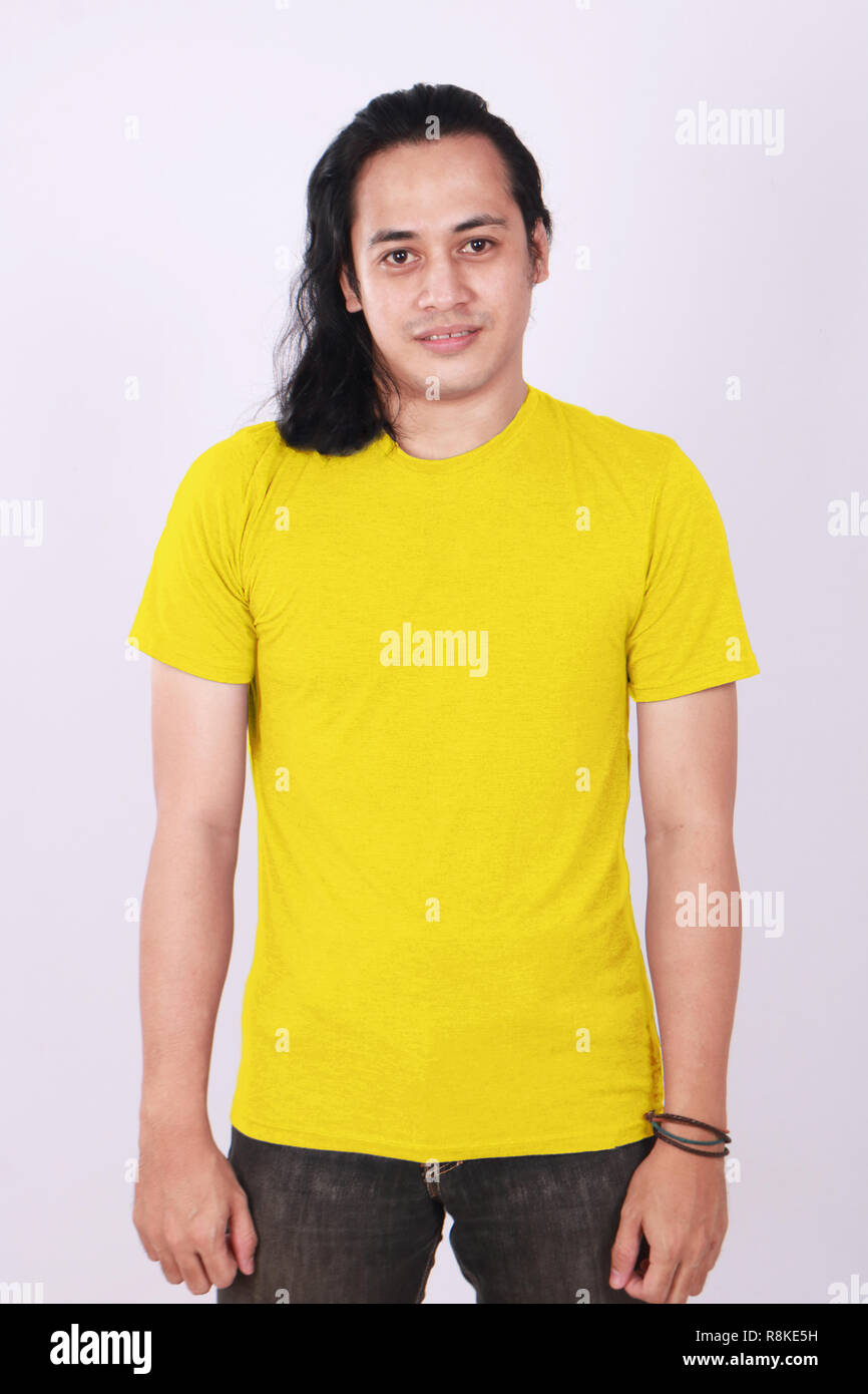 Download Man With Yellow Shirt And Jeans High Resolution Stock Photography And Images Alamy PSD Mockup Templates