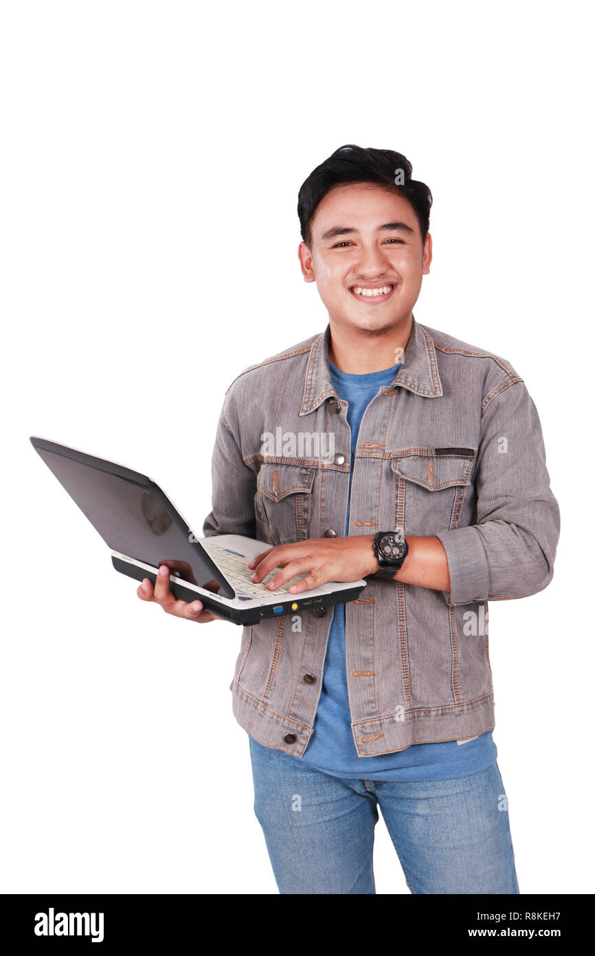 Photo image portrait of a cute young Asian male student standing and ...