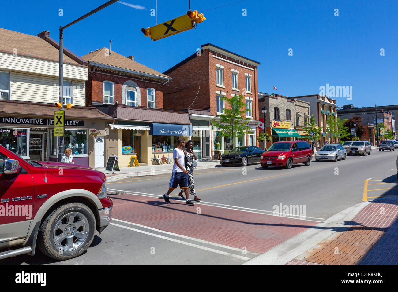 Canada, Province of Ontario, Prince Edward County, Picton City, Main Street and its various shops, pedestrian crossing Stock Photo