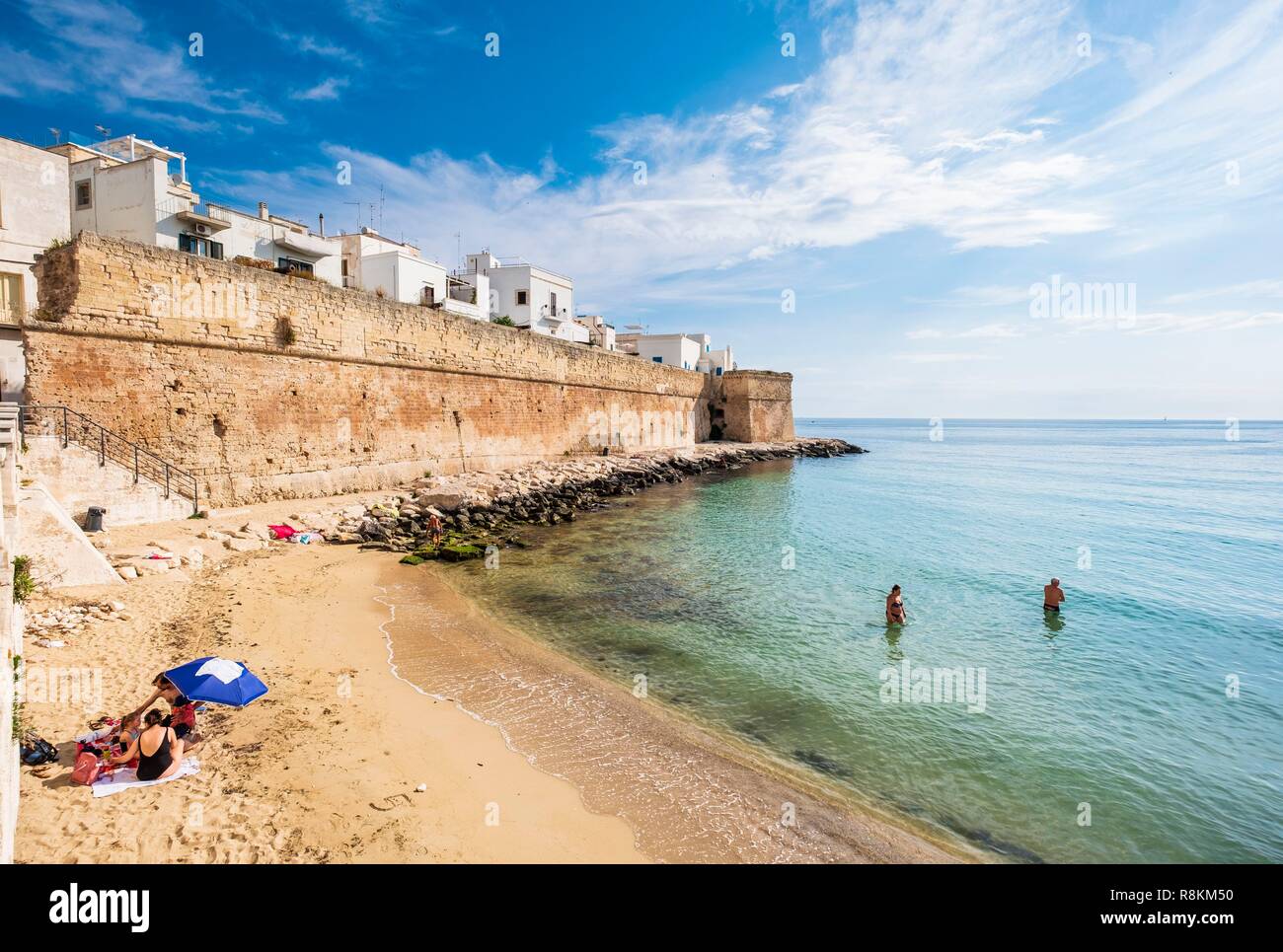 Italy, Apulia, Monopoli, Cala Porta Vecchia is a small cove at the foot of  the fortified walls of the sixteenth century that protect the historic  centre Stock Photo - Alamy