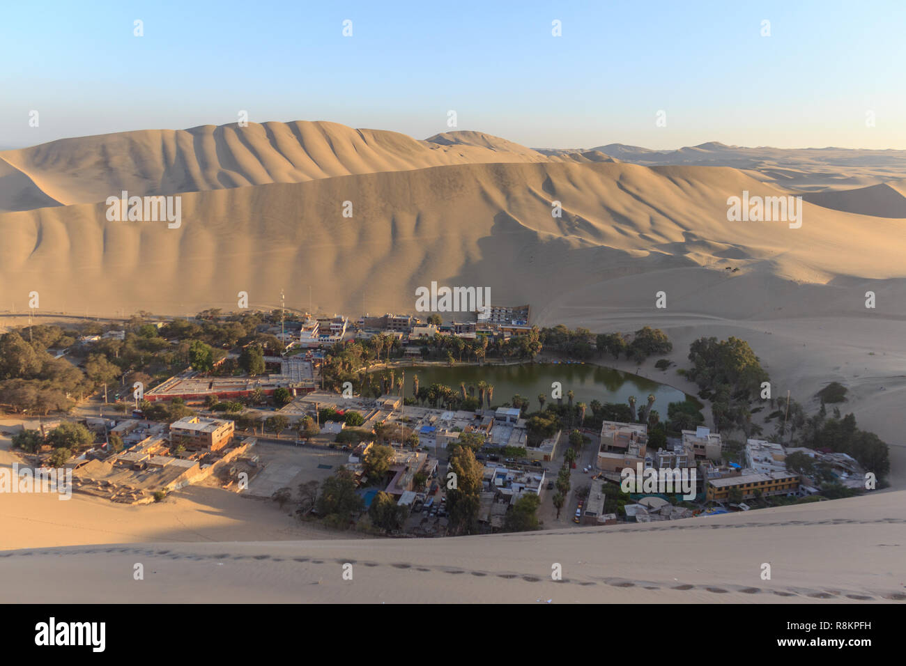 sunset at huacachina desert oasis in peru Stock Photo - Alamy