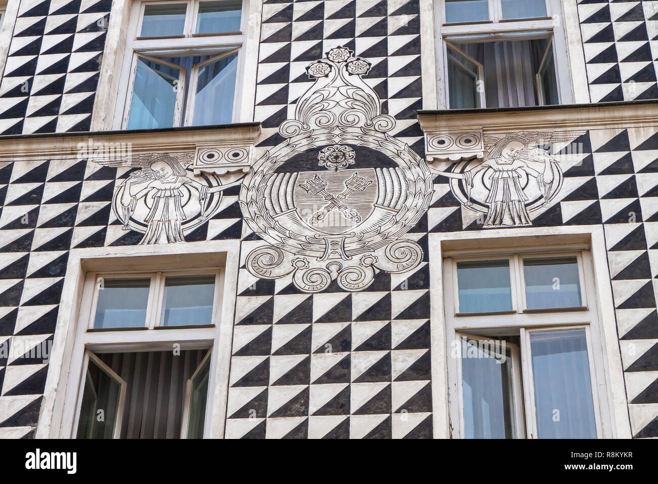 Patterned design on a building in Krakow Stock Photo