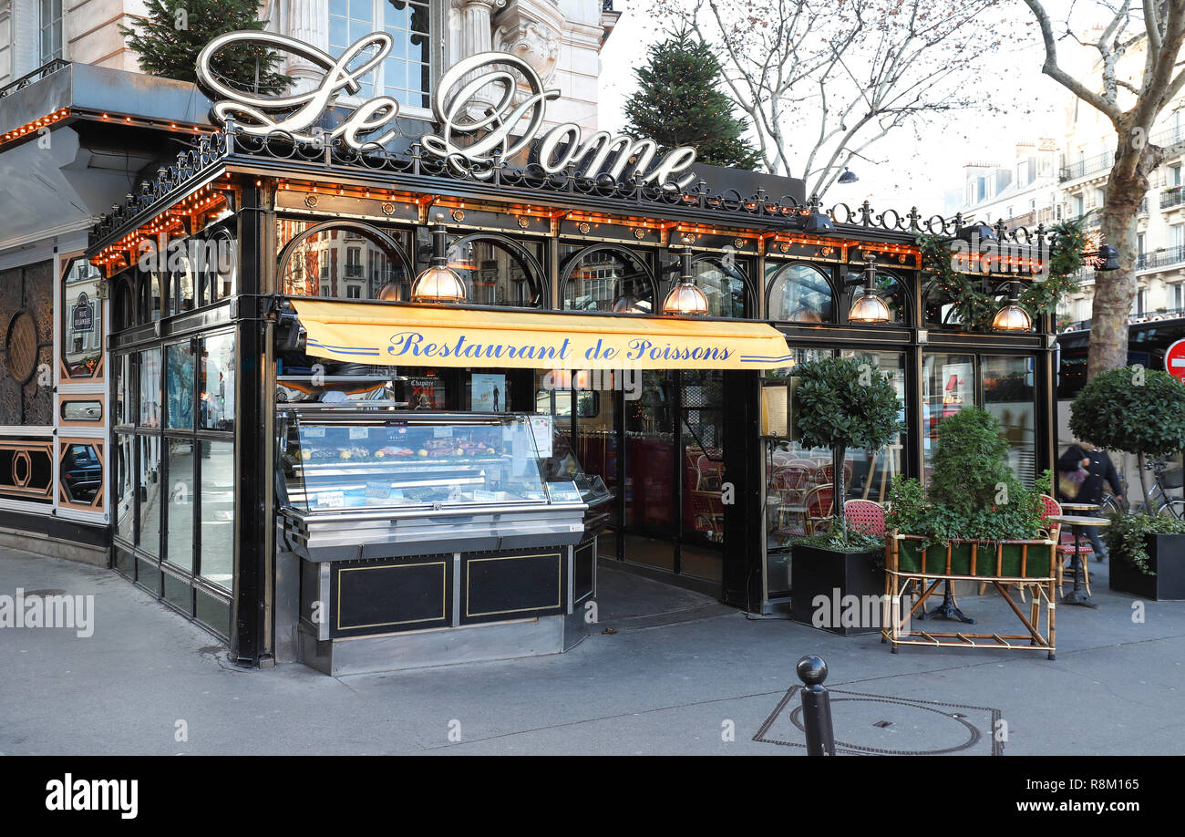 The famous restaurant Le Dome decorated for Christmas located on Montparnasse boulevard in Paris.It was once home for to intellectual stars , from Hemingway to Picasso Stock Photo