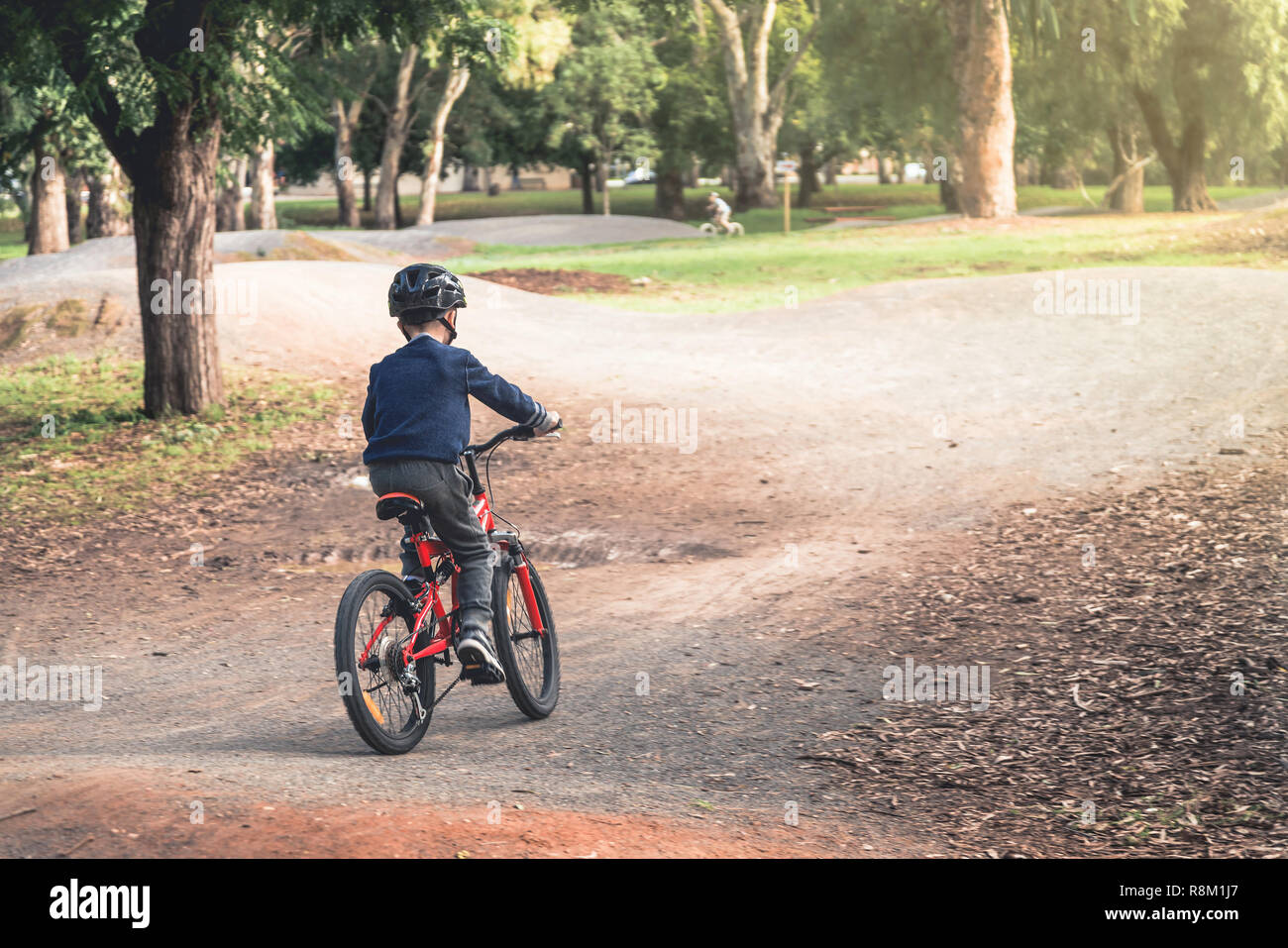 Australian boy riding his bicycles on dirt bike track in Adelaide