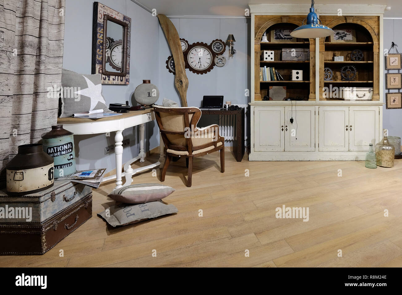 Concept of interior of the room where lives engineer. Interior of the room in the style of mechanician. Stock Photo