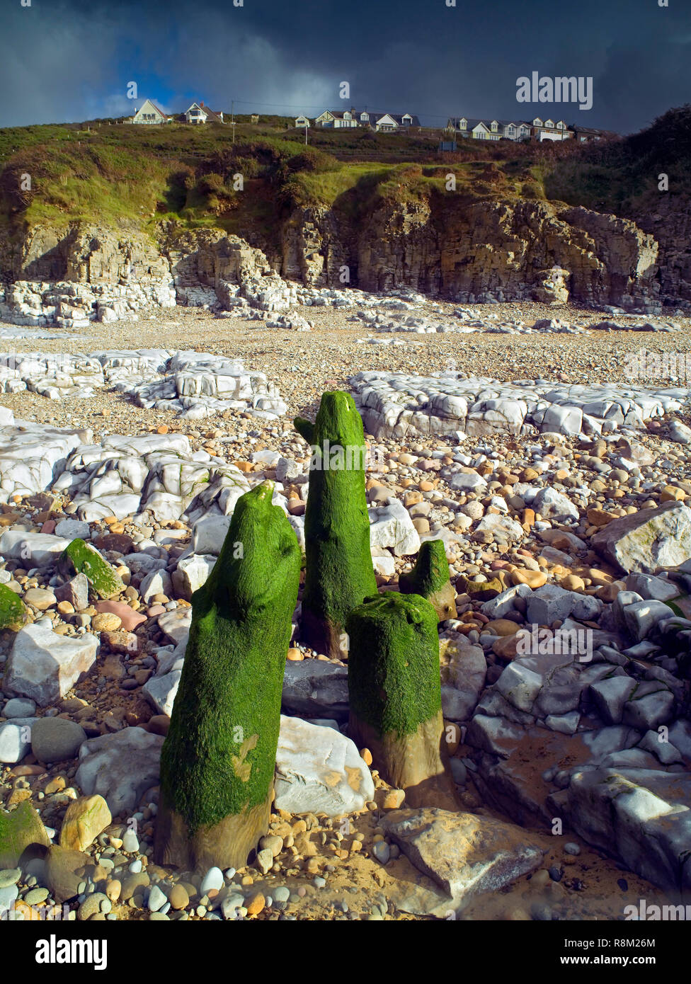 A sunny view of the pebbled beach at Ogmore-by-Sea on the Glamorgan Heritage Coast. Stock Photo