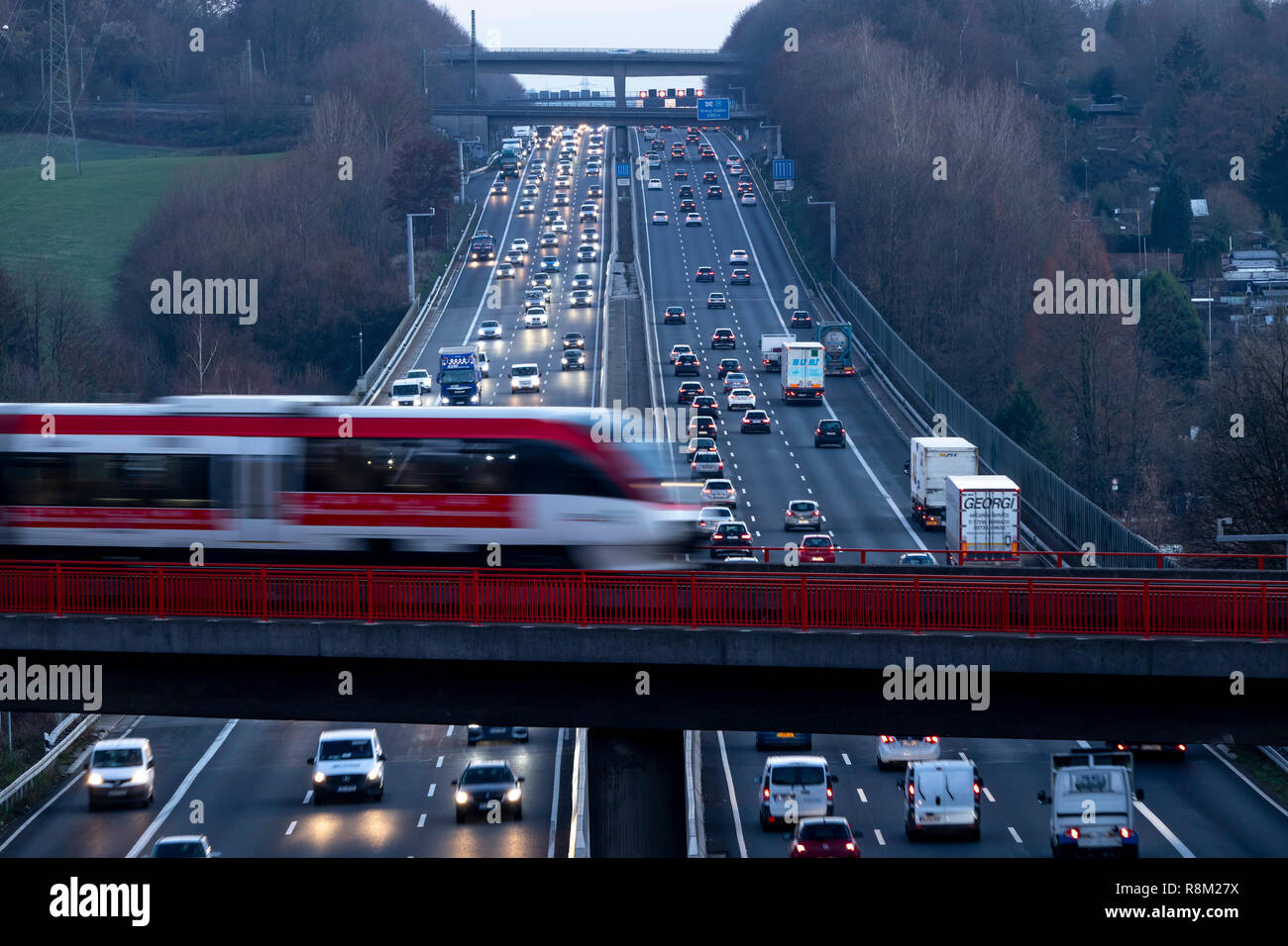 Autobahn, A3 motorway between DŸsseldorf and Leverkusen, near Erkrath, Germany, railway bridge, local train, Stock Photo