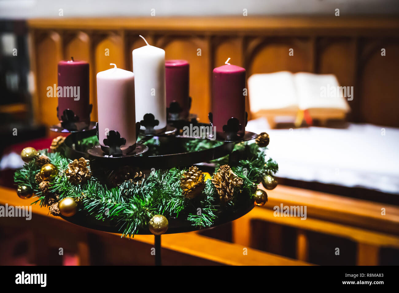 Advent decoration candles with gradation of purple colors Stock Photo Alamy