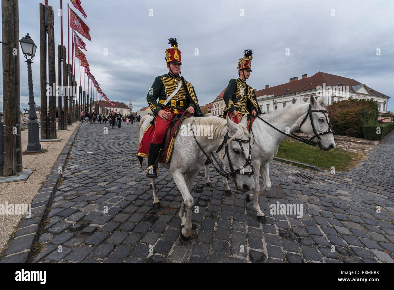 Hussars on horseback riding in Buda Castle, Budapest, Hungary Stock Photo