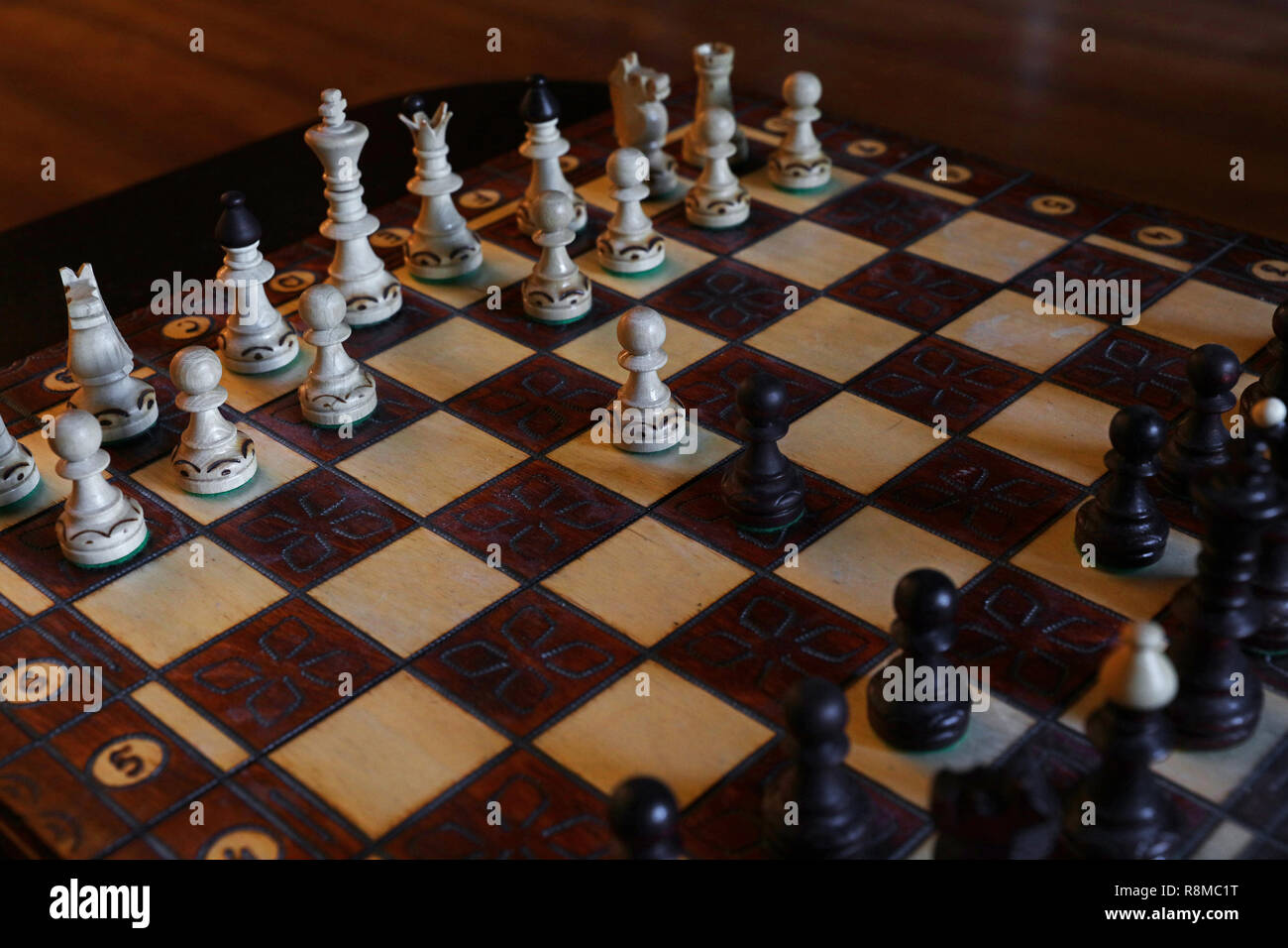 Chess pieces in starting position on a wooden oak Board Stock Photo - Alamy