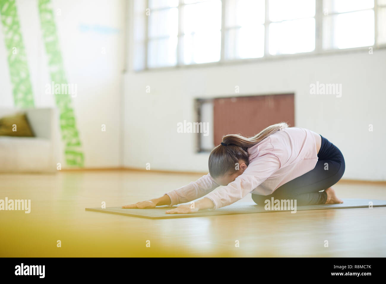 Stretching forwards hi-res stock photography and images - Alamy