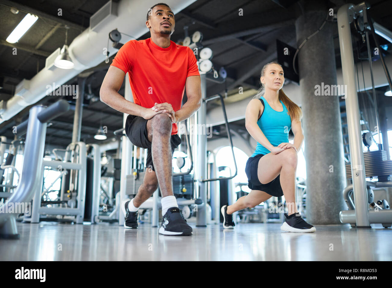 Doing exercise after coach Stock Photo Alamy