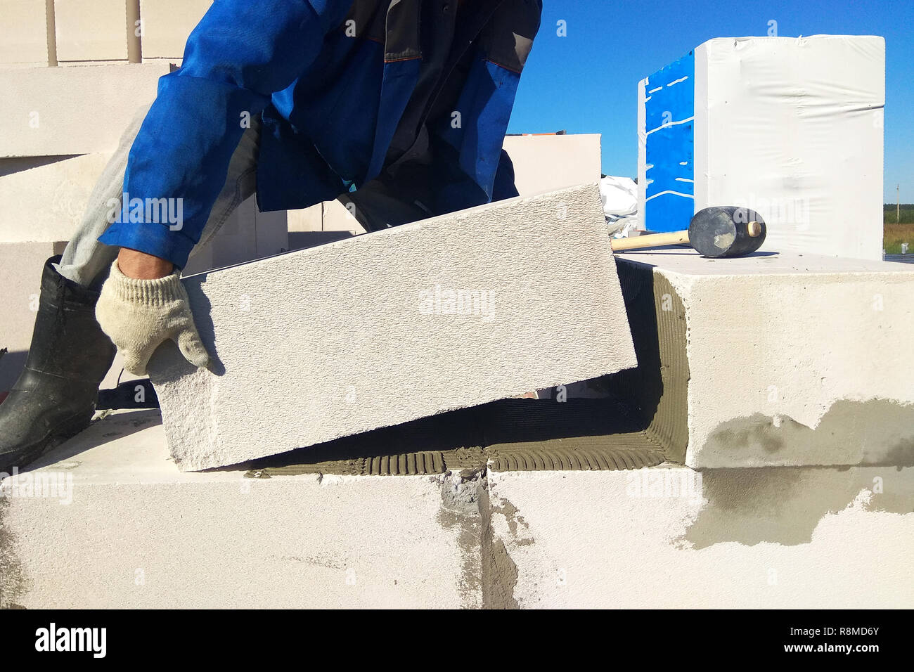 The process of masonry gas blocks to glue with a spatula 2018 Stock Photo Alamy