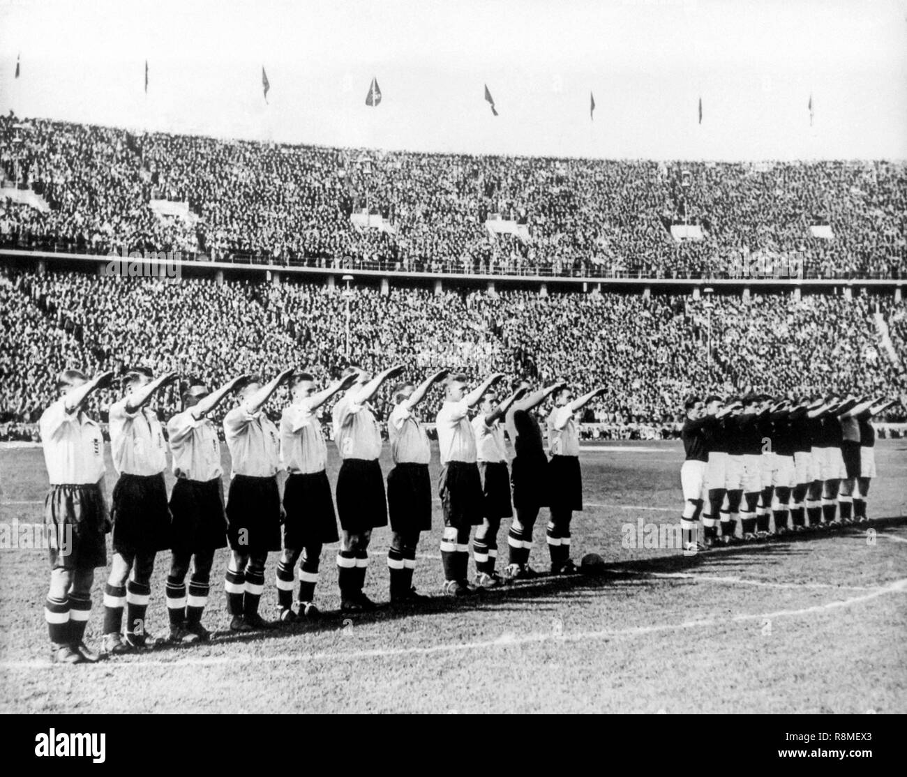 Marseilles ,France. June, 1938. The Italian soccer team make the roman salute before the match Stock Photo