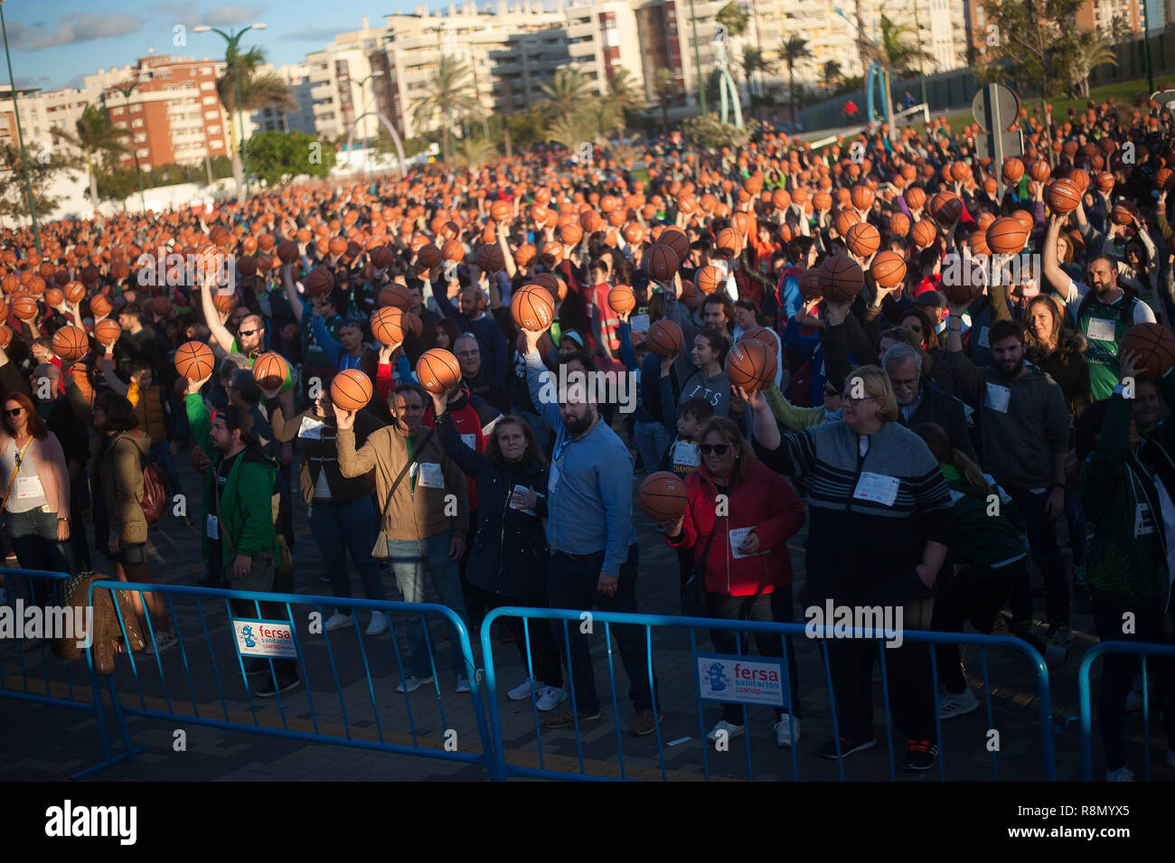 Malaga, MALAGA, Spain. 16th Dec, 2018. Participants are seen holding up