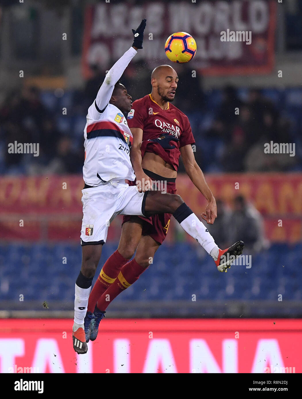 (181217) --ROME, Dec. 17, 2018 (Xinhua) -- AS Roma's Steven Nzonzi (R) vies with Genoa's Christian Kouame during the Serie A soccer match between Roma and Genoa, in Rome, Italy, Dec.16, 2018. AS Roma won 3-2. (Xinhua/Alberto Lingria) Stock Photo