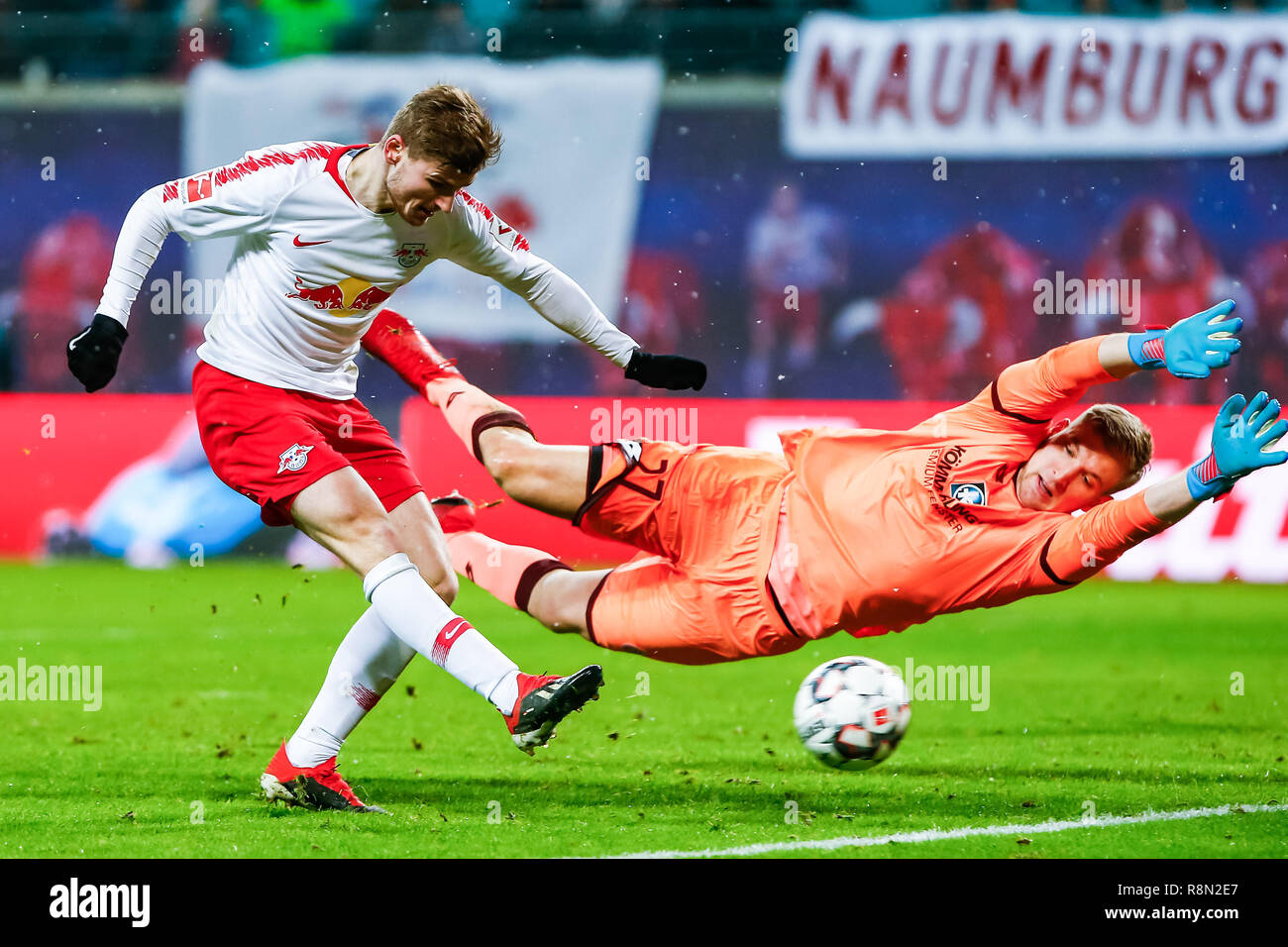 Leipzig, Germany. 16th Dec, 2018. Timo Werner (L) of Leipzig shoots during the Bundesliga match between RB Leipzig and FSV Mainz 05 in Leipzig, Germany, Dec. 16, 2018. Leipzig won 4-1. Credit: Kevin Voigt/Xinhua/Alamy Live News Stock Photo