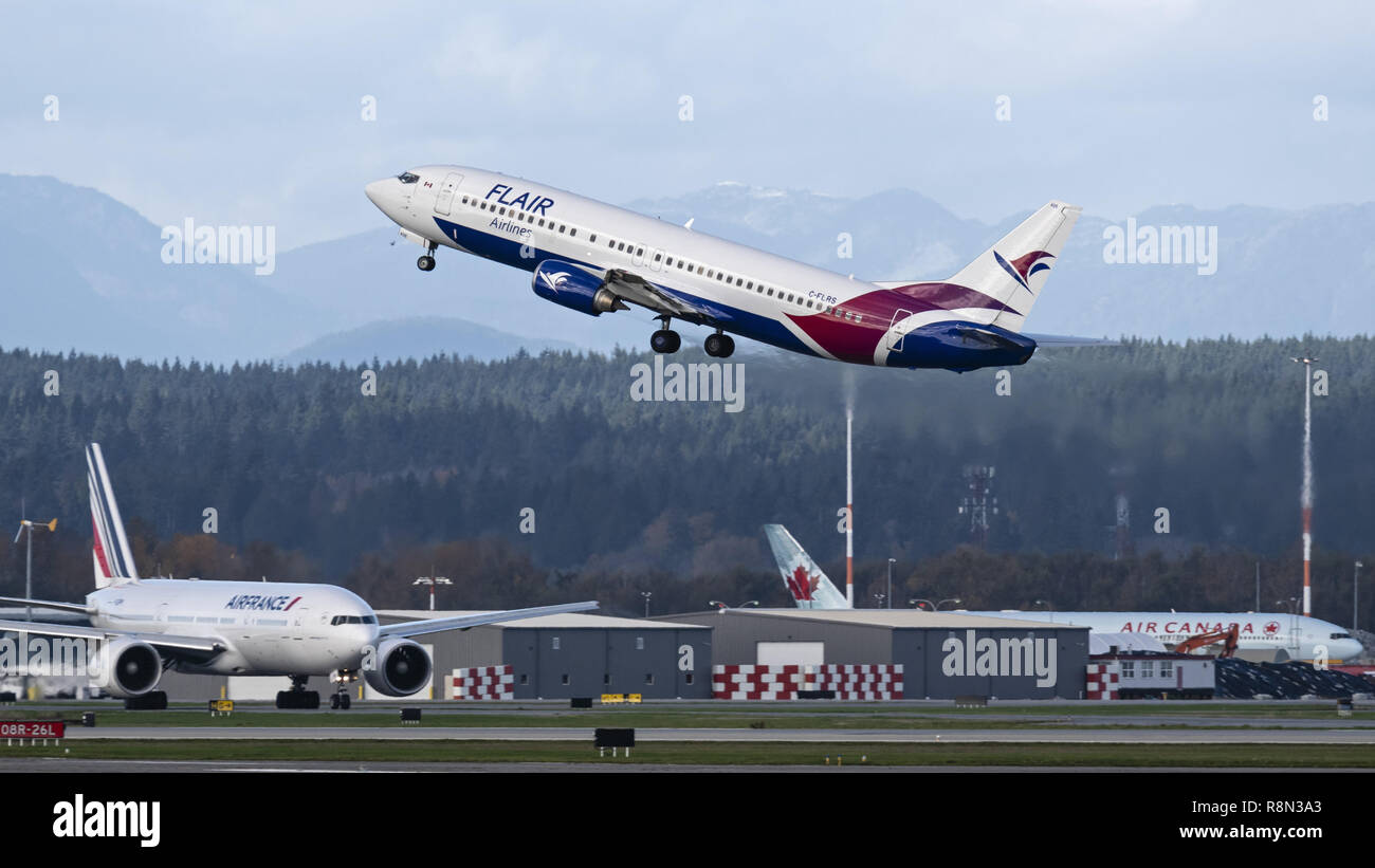 Richmond, British Columbia, Canada. 4th Nov, 2018. A Flair Airlines Boeing 737-400 (C-FLRS) jet airliner airborne after take-off from Vancouver International Airport. The airline has started ultra-low-cost sevice in Canada and is headquartered in Edmonton, Alberta. Credit: Bayne Stanley/ZUMA Wire/Alamy Live News Stock Photo