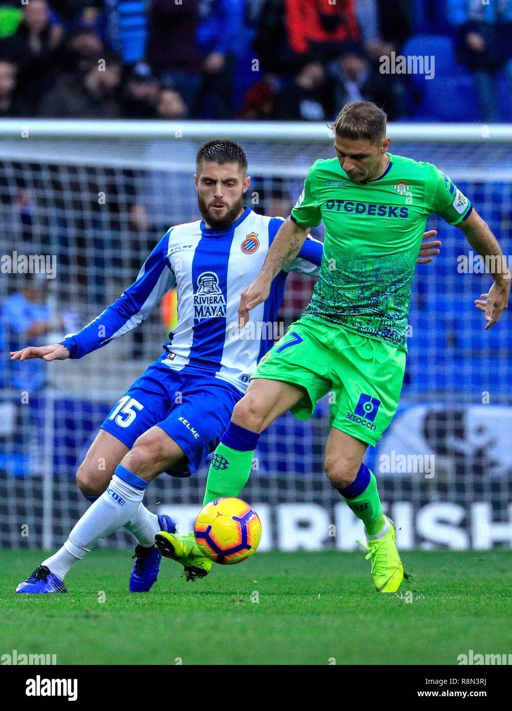Barcelona, Spain. 16th Dec, 2018. RCD Espanyol's David Lopez (L) vies with Real  Betis' Joaquin Sanchez Rodriguez during a Spanish league match between RCD  Espanyol and Real Betis in Barcelona, Spain, on