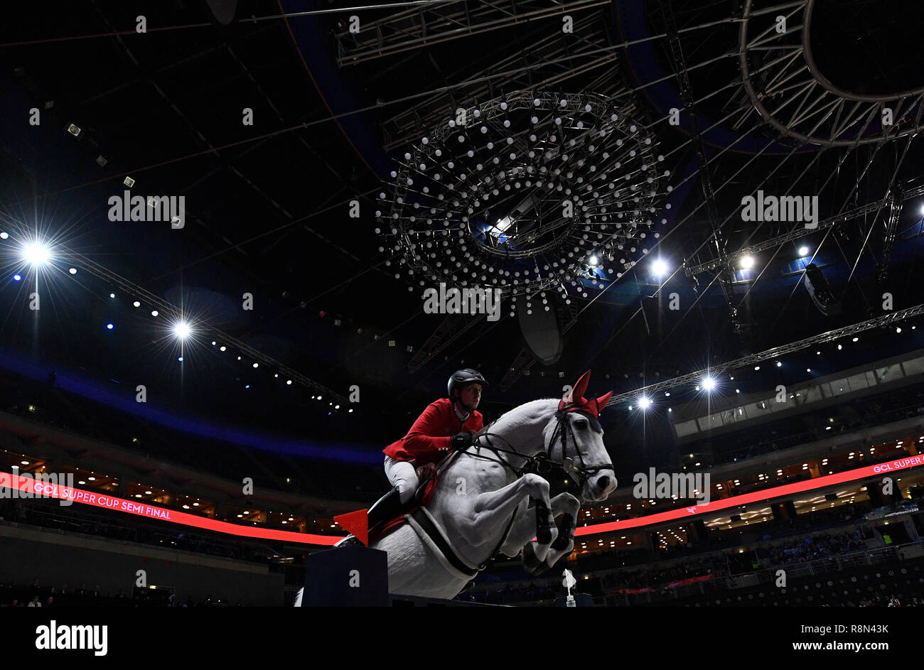 Prague, Czech Republic. 14th Dec, 2018. Martin Fuchs, show jumper from London Knights team, competes with horse called Clooney 51 during Super Cup Teams race, semifinals, within the Global Champions League show jumping, in Prague, Czech Republic, on December 14, 2018. Credit: Michal Krumphanzl/CTK Photo/Alamy Live News Stock Photo