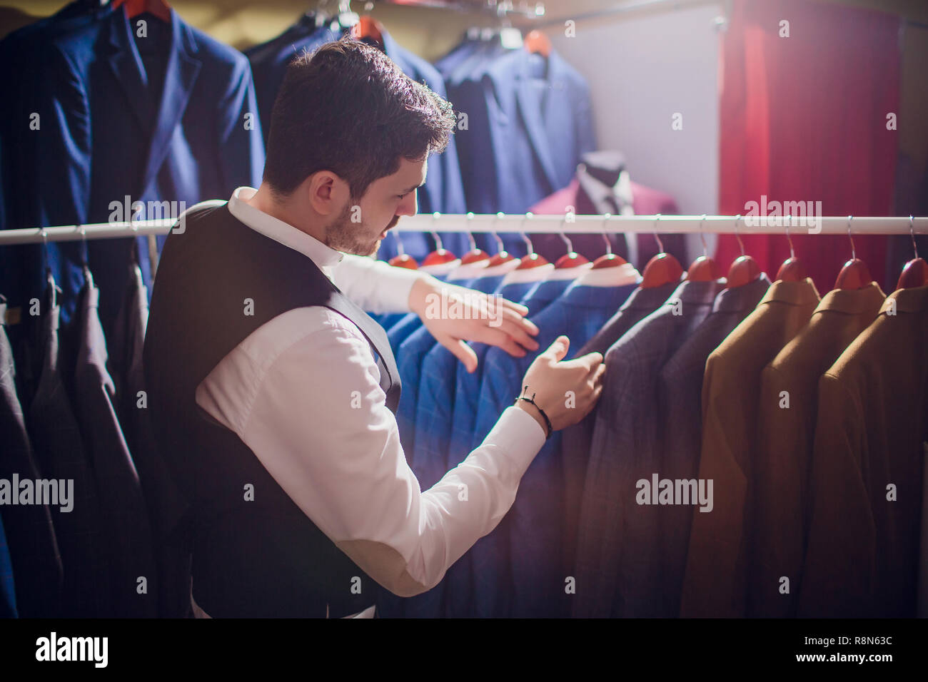 Tailor, tailoring. Men's suit, tailor in his Elegant man's