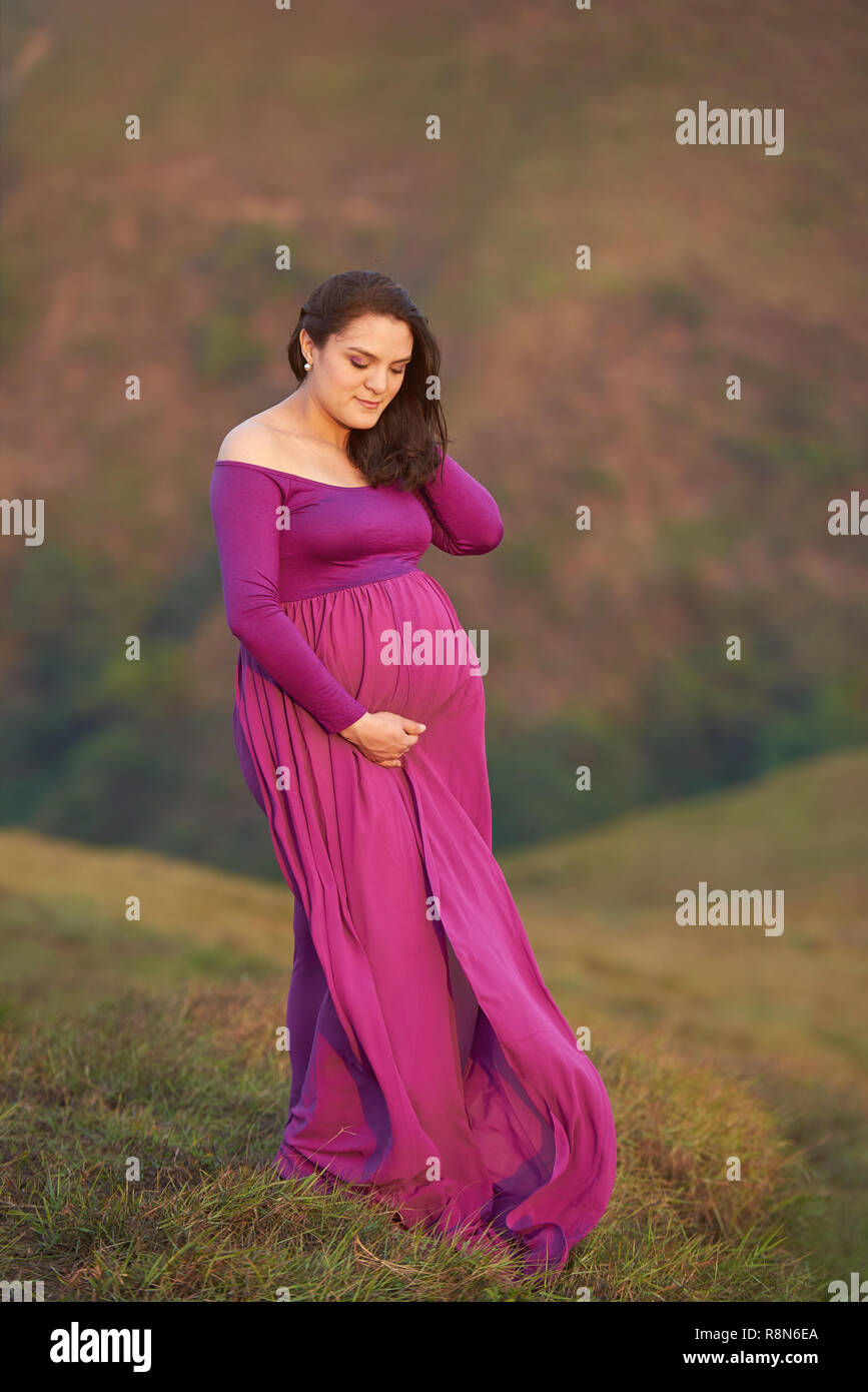 Young and pregnant and woman hi-res stock photography and images - Alamy