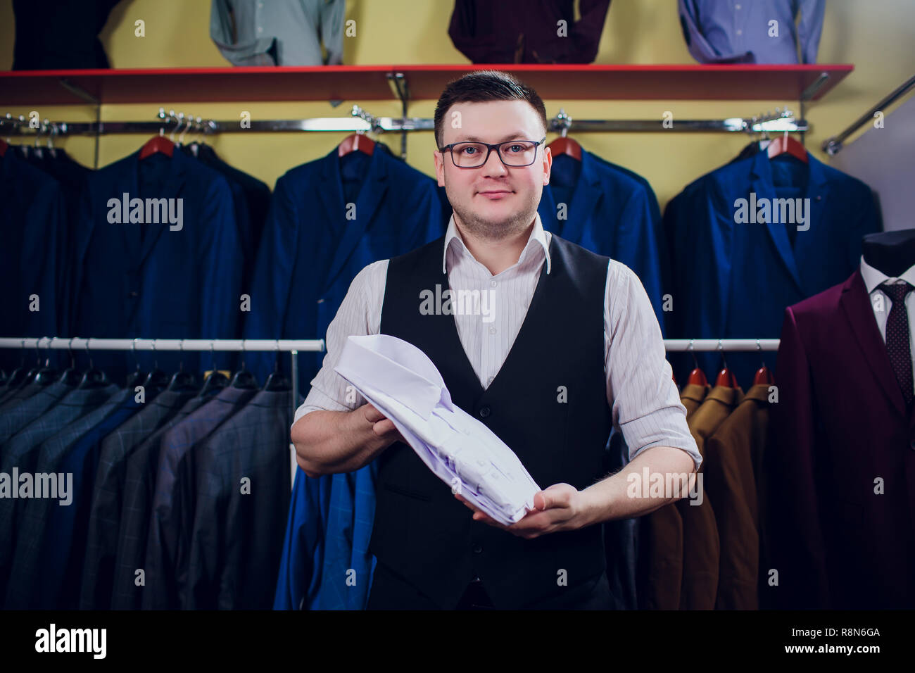 man is buying shirt in store Stock Photo Alamy
