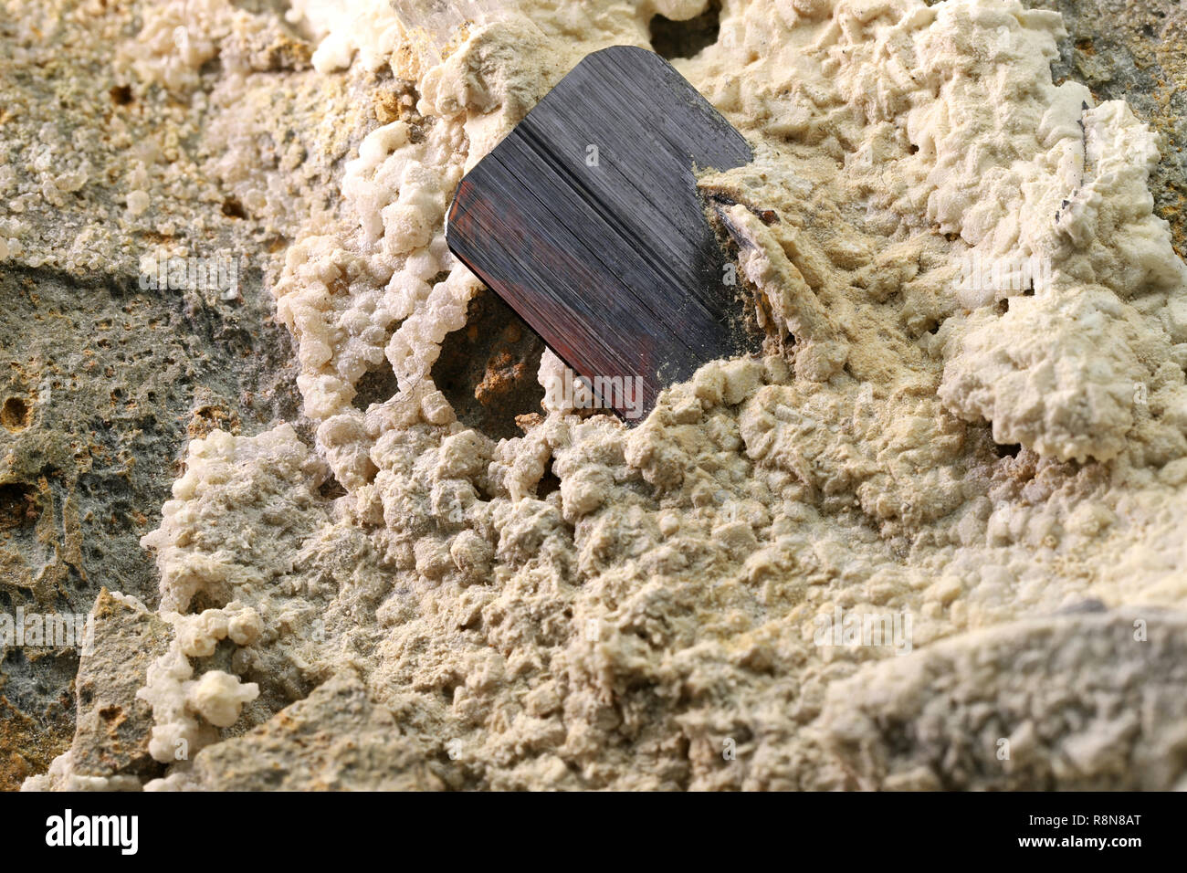 brookite from Zard Mountains, Kharan, Baluchistan nestled in matrix Stock Photo