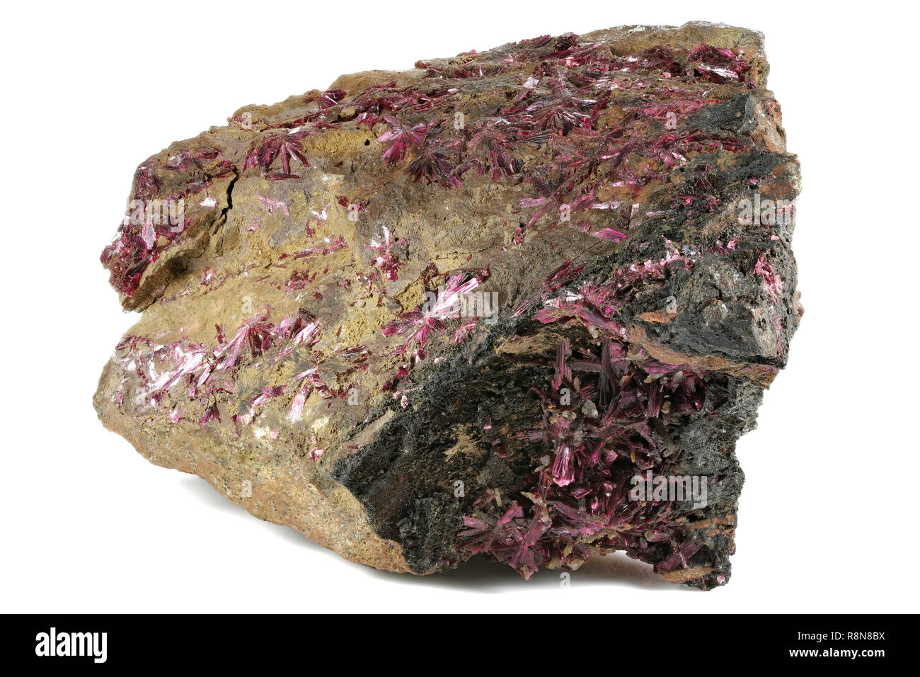 erythrite (red cobalt) from Bou Azzer, Morocco isolated on white background Stock Photo