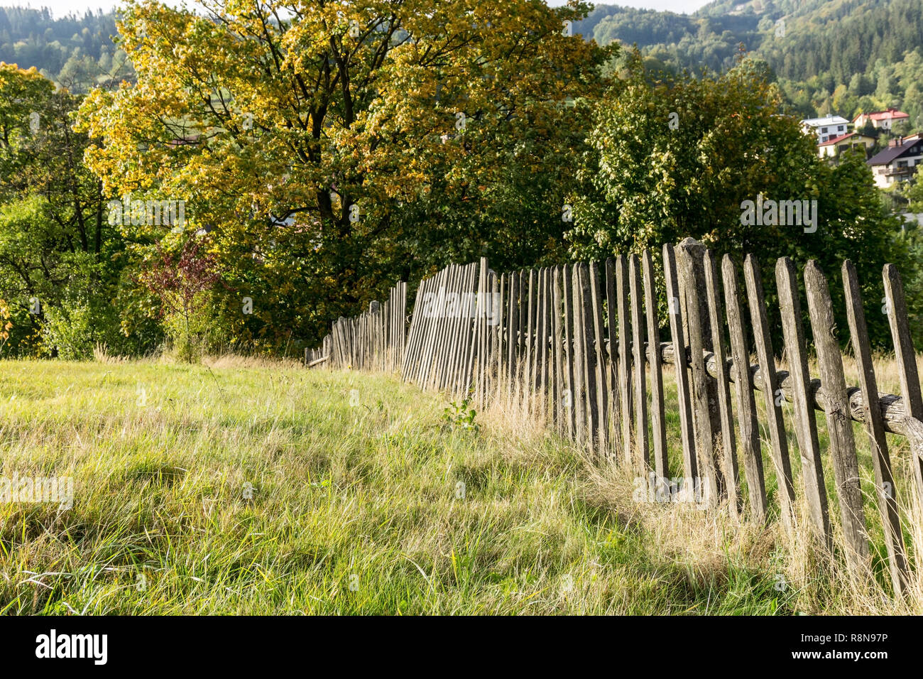 Old broken wooden fence. Rural mountain landscape. Silesian Beskids, Poland. Stock Photo