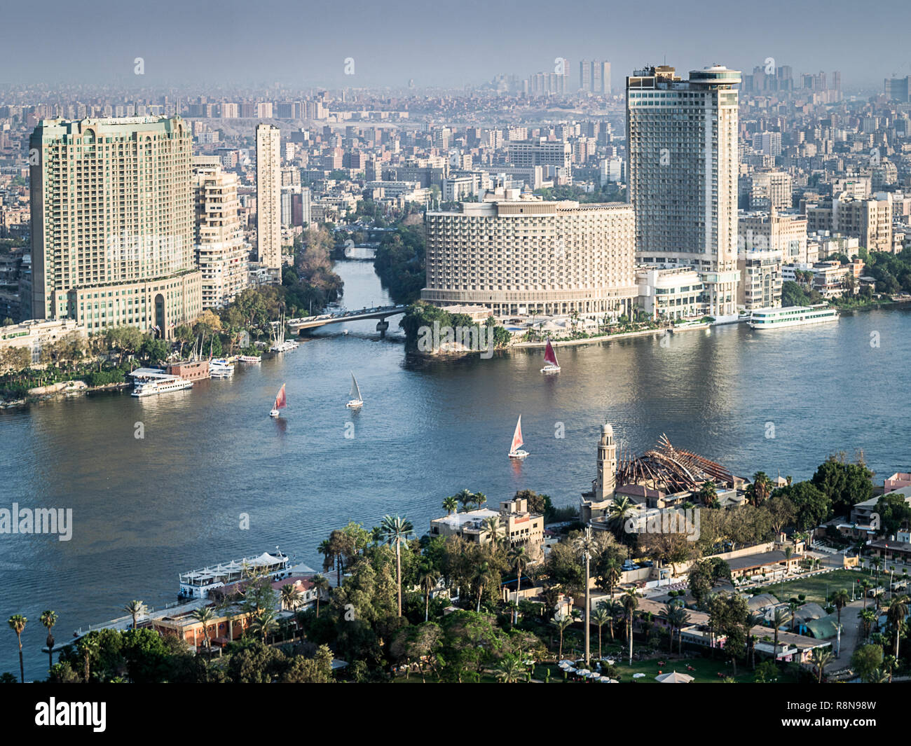 Sunset scene from the top of cairo tower in Egypt shows Egyptian TV and radio buliding ,  the nile , the city , buildings and bridge Stock Photo