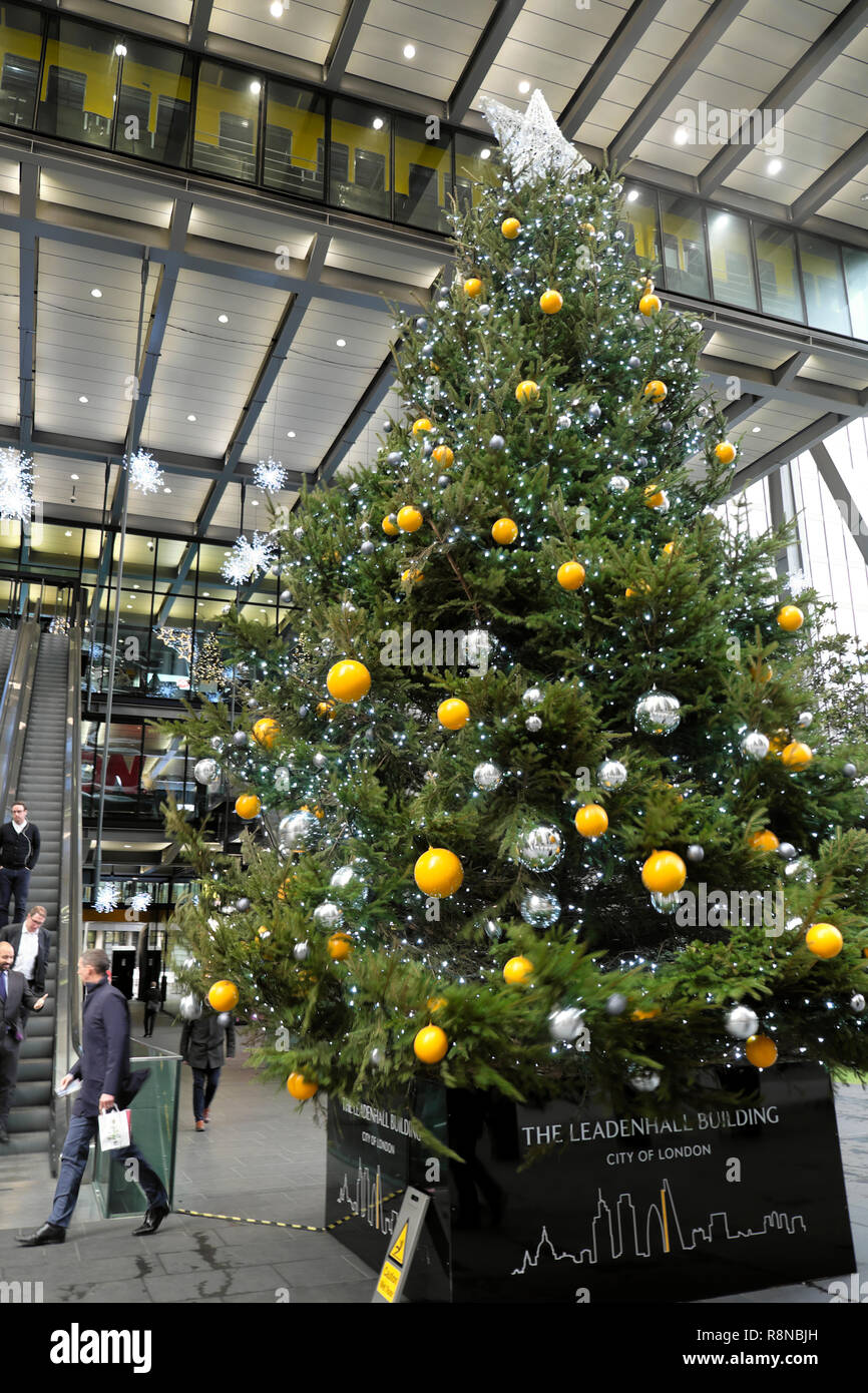 Vertical view of large Christmas tree with glass baubles decorations outside the Leadenhall office building in the City of London UK  KATHY DEWITT Stock Photo