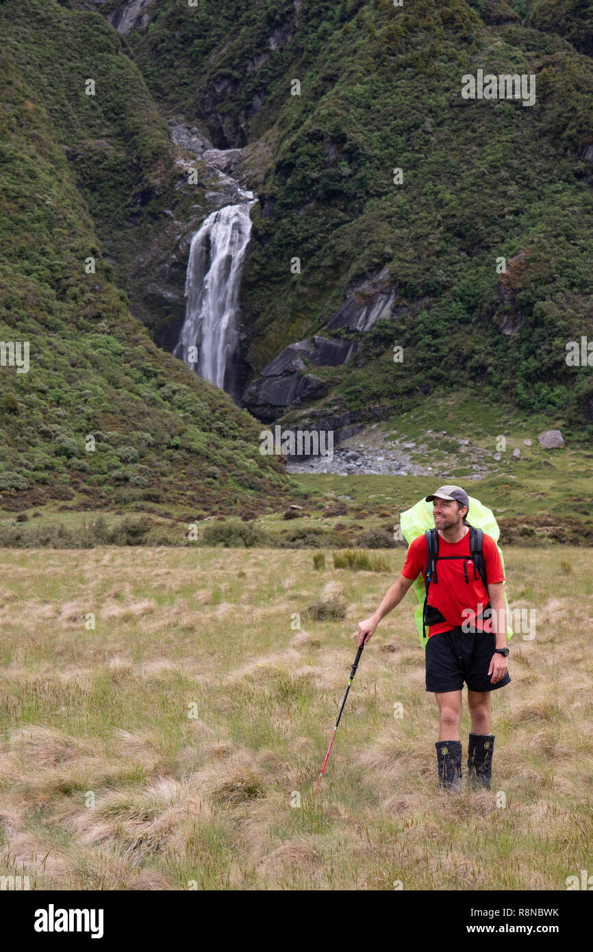 Hiker in the wilderness, New Zealand Stock Photo