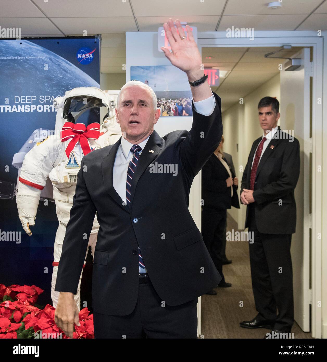 U.S. Vice President Mike Pence waves goodbye to NASA employees following a discussion about the progress on Space Policy Directive 1 at NASA Headquarters December 12, 2018 in Washington, DC. Stock Photo