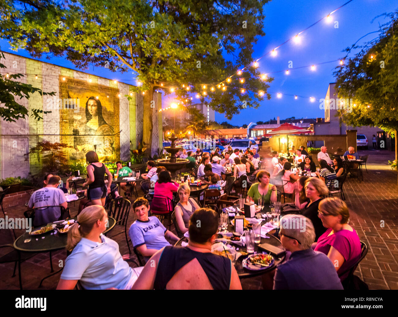 Diners relax on the back patio at Raging Burrito in Decatur, Georgia, June 4, 2014. Stock Photo