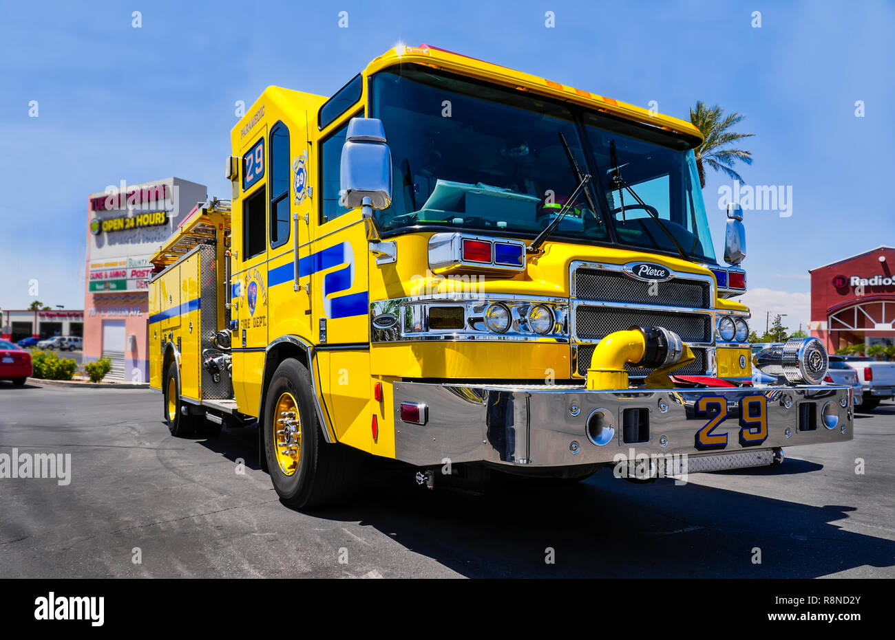 Yellow Fire Truck from the Clark County Fire Department parked on the street in Las Vegas Stock Photo