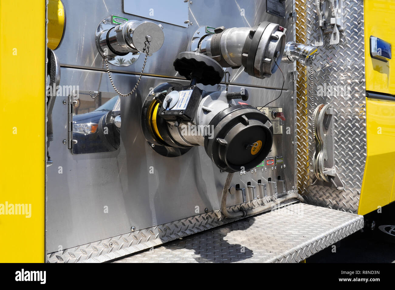 Close up of a Yellow Fire Truck from the Clark County Fire Department parked on the street in Las Vegas Stock Photo