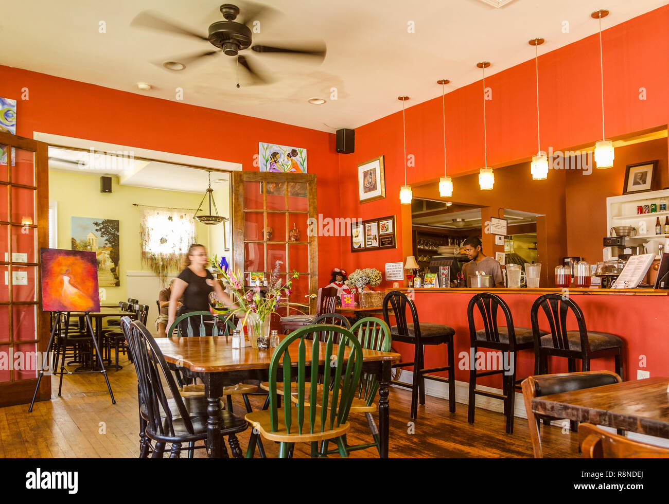 A waitress walks through the dining room at the Sweet Potato Cafe in Stone Mountain, Georgia. Stock Photo