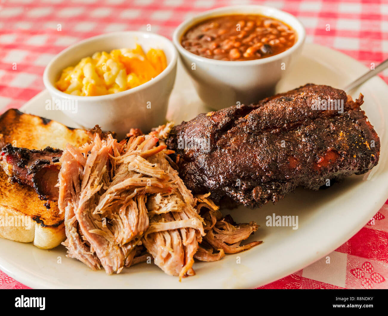 Smoked ribs, pulled pork and brisket is served with macaroni and cheese