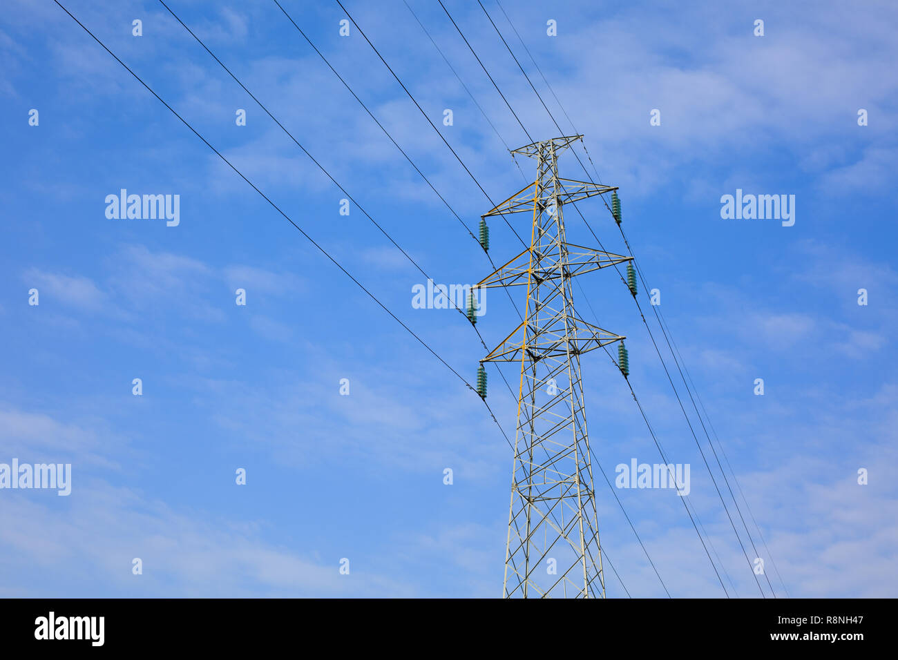 A high voltage tower is under the blue sky Stock Photo - Alamy
