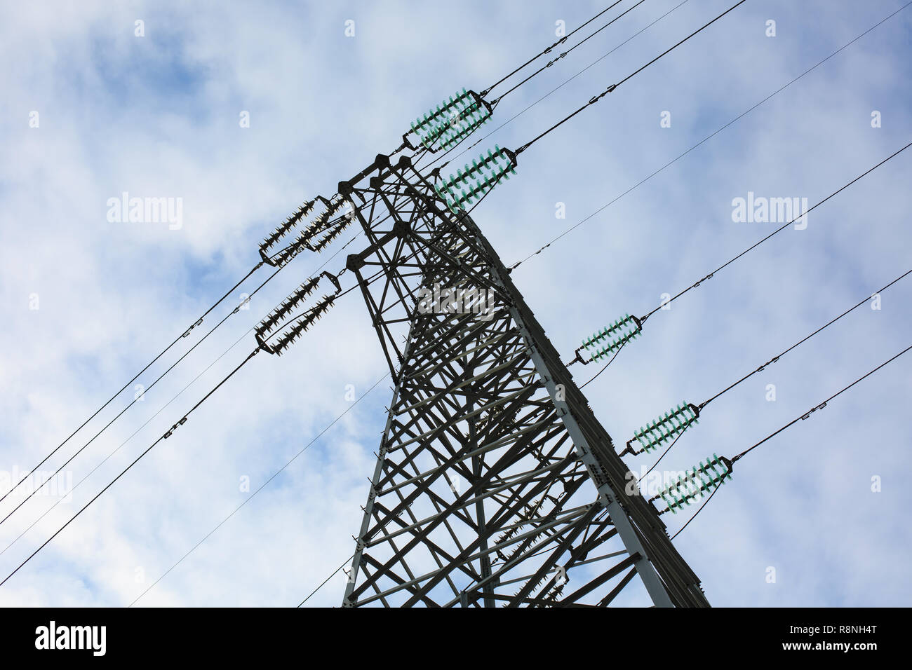 A high voltage tower is under the blue sky Stock Photo - Alamy
