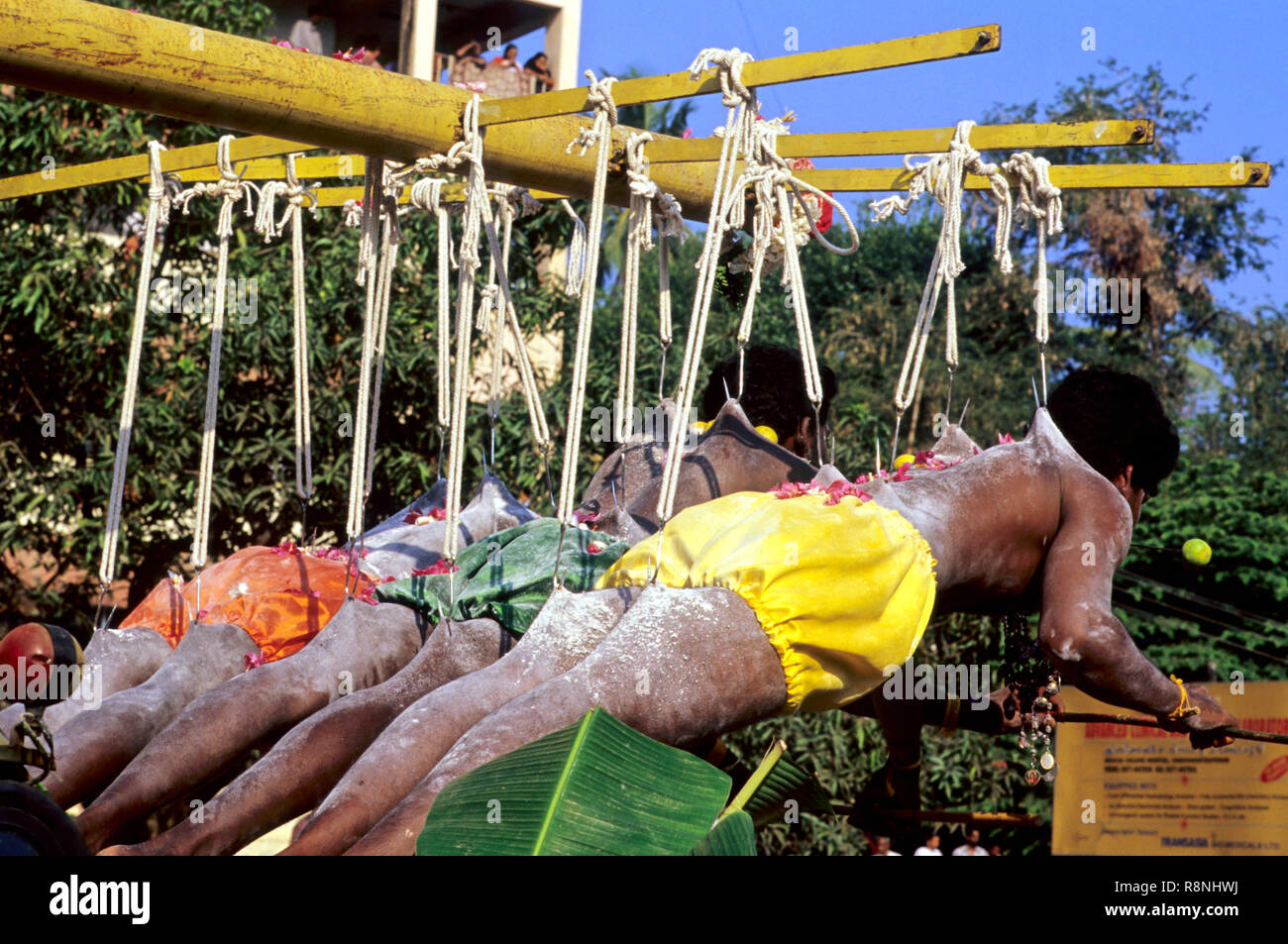 Thaipoya festival hooked and hung devotees of lord durga, trivandrum, kerala, india Stock Photo